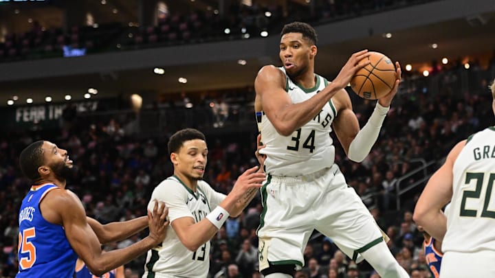 Oct 28, 2025; Milwaukee, Wisconsin, USA;  Milwaukee Bucks forward Giannis Antetokounmpo (34) grabs a rebound in the 3rd quarter against the New York Knicks at Fiserv Forum. Mandatory Credit: Benny Sieu-Imagn Images