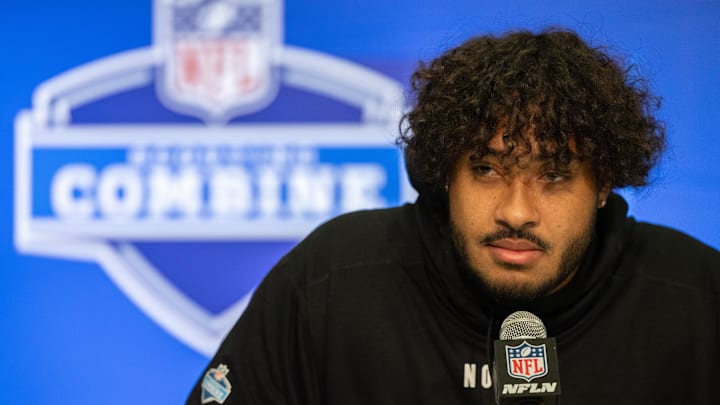 Mar 2, 2024; Indianapolis, IN, USA; Arizona offensive lineman Jordan Morgan (OL52) talks to the