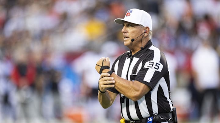 Aug 1, 2024; Canton, Ohio, USA; NFL referee John Hussey (35) makes a call for holding during the first quarter between the Chicago Bears and the Houston Texans at Tom Benson Hall of Fame Stadium. Aug 1, 2024; Canton, Ohio, USA; NFL referee John Hussey (35) makes a call for holding during the first quarter between the Chicago Bears and the Houston Texans at Tom Benson Hall of Fame Stadium.