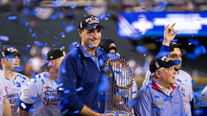 Nov 1, 2023; Phoenix, Arizona, USA; Texas Rangers general manager Chris Young celebrates with the trophy after winning the 2023 World Series in five game against the Arizona Diamondbacks at Chase Field. 