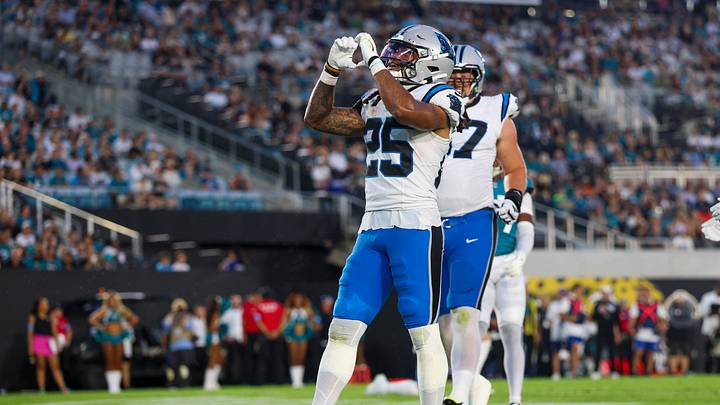 Carolina Panthers running back Jonathon Brooks (25) reacts after scoring a touchdown 