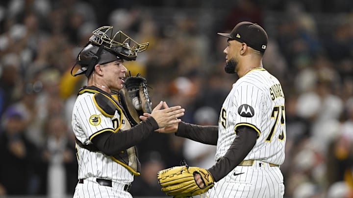 Sep 27, 2025; San Diego, California, USA; San Diego Padres relief pitcher Robert Suarez (75) and Freddy Fermin (54) celebrate after the Padres beat the Arizona Diamondbacks at Petco Park. Mandatory Credit: Denis Poroy-Imagn Images Sep 27, 2025; San Diego, California, USA; San Diego Padres relief pitcher Robert Suarez (75) and Freddy Fermin (54) celebrate after the Padres beat the Arizona Diamondbacks at Petco Park. Mandatory Credit: Denis Poroy-Imagn Images