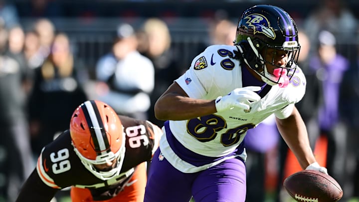 Oct 27, 2024; Cleveland, Ohio, USA; Baltimore Ravens tight end Isaiah Likely (80) runs with the ball after a catch as Cleveland Browns safety Rodney McLeod Jr. (12) defends during the second half at Huntington Bank Field. Mandatory Credit: Ken Blaze-Imagn Images Oct 27, 2024; Cleveland, Ohio, USA; Baltimore Ravens tight end Isaiah Likely (80) runs with the ball after a catch as Cleveland Browns safety Rodney McLeod Jr. (12) defends during the second half at Huntington Bank Field. Mandatory Credit: Ken Blaze-Imagn Images