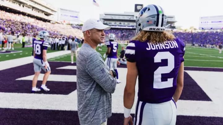 Matt Wells talks with Avery Johnson (2) before a Kansas State football game in Manhattan, Kansas at Bill Snyder Family Stadium last season. Mandatory Credit: K-State Athletics
