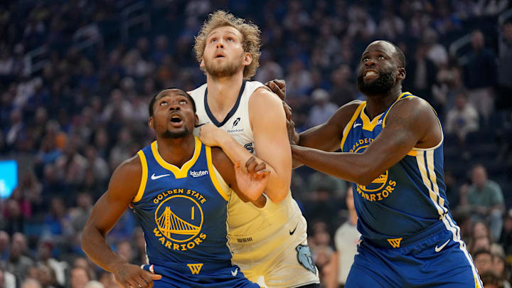 Oct 27, 2025; San Francisco, California, USA; Golden State Warriors forward Jonathan Kuminga (1) and forward Draymond Green (23) battle for position with Memphis Grizzlies center Jock Landale (31) in the first quarter at the Chase Center. Mandatory Credit: Cary Edmondson-Imagn Images Oct 27, 2025; San Francisco, California, USA; Golden State Warriors forward Jonathan Kuminga (1) and forward Draymond Green (23) battle for position with Memphis Grizzlies center Jock Landale (31) in the first quarter at the Chase Center. Mandatory Credit: Cary Edmondson-Imagn Images