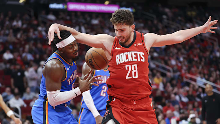 Dec 1, 2024; Houston, Texas, USA; Oklahoma City Thunder guard Luguentz Dort (5) steals the ball away from Houston Rockets center Alperen Sengun (28) during the third quarter at Toyota Center. Mandatory Credit: Troy Taormina-Imagn Images Dec 1, 2024; Houston, Texas, USA; Oklahoma City Thunder guard Luguentz Dort (5) steals the ball away from Houston Rockets center Alperen Sengun (28) during the third quarter at Toyota Center. Mandatory Credit: Troy Taormina-Imagn Images