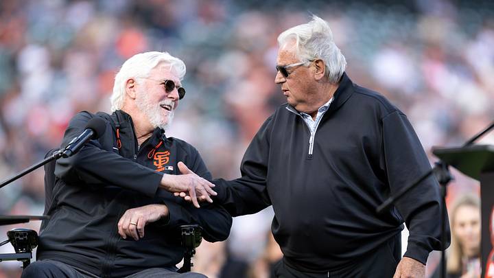 San Francisco, California, USA;  Longtime broadcast team Mike Krukow (left) and Duane Kuiper greet each other during a postgame celebration to mark Krukow's retirement at Oracle Park.  Mandatory Credit: D. Ross Cameron-Imagn Images