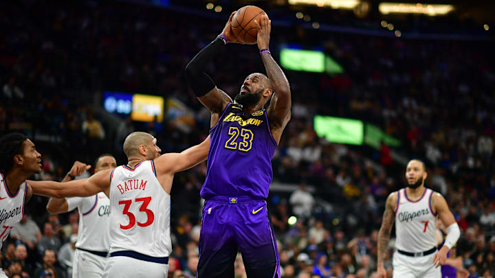 Jan 19, 2025; Inglewood, California, USA; Los Angeles Lakers forward LeBron James (23) moves to the basket against Los Angeles Clippers forward Nicolas Batum (33) during the second half at Intuit Dome. Mandatory Credit: Gary A. Vasquez-Imagn Images Jan 19, 2025; Inglewood, California, USA; Los Angeles Lakers forward LeBron James (23) moves to the basket against Los Angeles Clippers forward Nicolas Batum (33) during the second half at Intuit Dome. Mandatory Credit: Gary A. Vasquez-Imagn Images