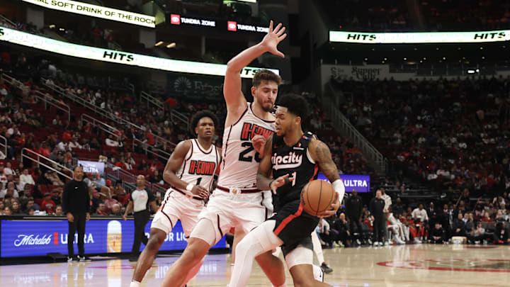 Nov 23, 2024; Houston, Texas, USA; Portland Trail Blazers guard Anfernee Simons (1) drives to the basket against Houston Rockets center Alperen Sengun (28) in the second half at Toyota Center. Mandatory Credit: Thomas Shea-Imagn Images