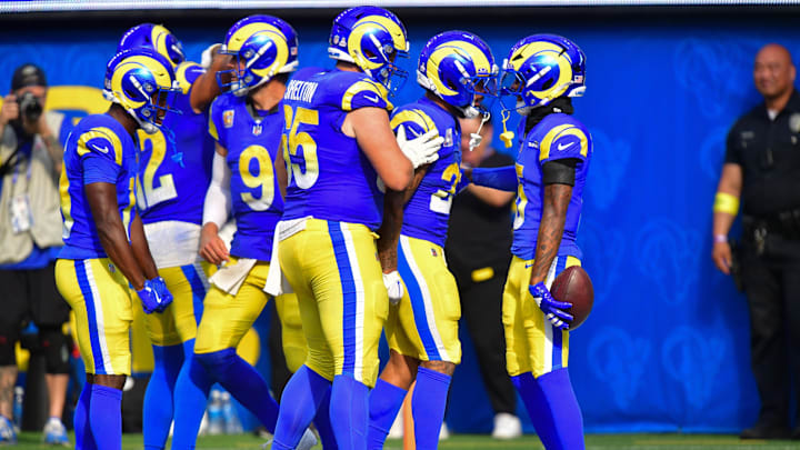 Sep 28, 2025; Inglewood, California, USA; Los Angeles Rams wide receiver Tutu Atwell (5) celebrates his touchdown scored against the Indianapolis Colts with running back Kyren Williams (23) and center Coleman Shelton (65) during the second half at SoFi Stadium. Mandatory Credit: Gary A. Vasquez-Imagn Images Sep 28, 2025; Inglewood, California, USA; Los Angeles Rams wide receiver Tutu Atwell (5) celebrates his touchdown scored against the Indianapolis Colts with running back Kyren Williams (23) and center Coleman Shelton (65) during the second half at SoFi Stadium. Mandatory Credit: Gary A. Vasquez-Imagn Images