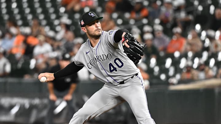 Jul 25, 2025; Baltimore, Maryland, USA;  Colorado Rockies pitcher Tyler Kinley (40) delivers a pitch during the eighth inning against the Baltimore Orioles at Oriole Park at Camden Yards. Mandatory Credit: James A. Pittman-Imagn Images