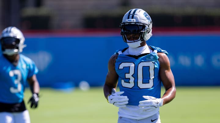 Jul 23, 2025; Charlotte, NC, USA; Carolina Panthers running back Chuba Hubbard (30) jogs back during Panthers training camp. Mandatory Credit: Scott Kinser-Imagn Images
