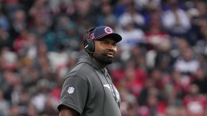 Oct 20, 2024; London, United Kingdom; New England Patriots coach Jerod Mayo watches from the sidelines against the New England Patriots in the second half of an NFL International Series game at Wembley Stadium. Mandatory Credit: Kirby Lee-Imagn Images