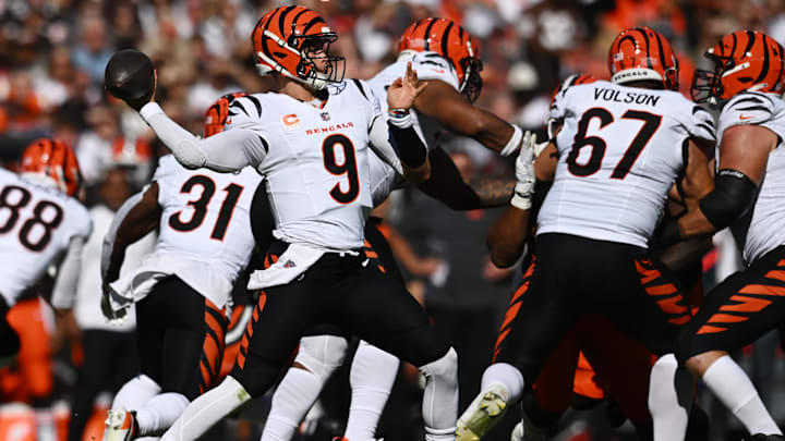 Oct 20, 2024; Cleveland, Ohio, USA; Cincinnati Bengals quarterback Joe Burrow (9) throws a pass during the first half against the Cleveland Browns at Huntington Bank Field. Mandatory Credit: Ken Blaze-Imagn Images