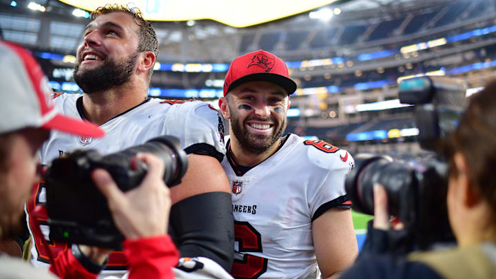 Dec 15, 2024; Inglewood, California, USA; Tampa Bay Buccaneers quarterback Baker Mayfield (6) celebrates the victory against the Los Angeles Chargers at SoFi Stadium. Mandatory Credit: Gary A. Vasquez-Imagn Images