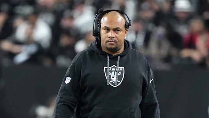 Dec 16, 2024; Paradise, Nevada, USA; Las Vegas Raiders coach Antonio Pierce watches from the sidelines against the Atlanta Falcons in the first half at Allegiant Stadium. Mandatory Credit: Kirby Lee-Imagn Images Dec 16, 2024; Paradise, Nevada, USA; Las Vegas Raiders coach Antonio Pierce watches from the sidelines against the Atlanta Falcons in the first half at Allegiant Stadium. Mandatory Credit: Kirby Lee-Imagn Images