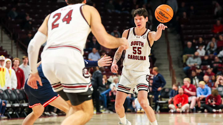 Nov 18, 2025; Columbia, South Carolina, USA; South Carolina Gamecocks guard Mike Sharavjamts (55) passes against the Radford Highlanders in the first half at Colonial Life Arena. Mandatory Credit: Jeff Blake-Imagn Images