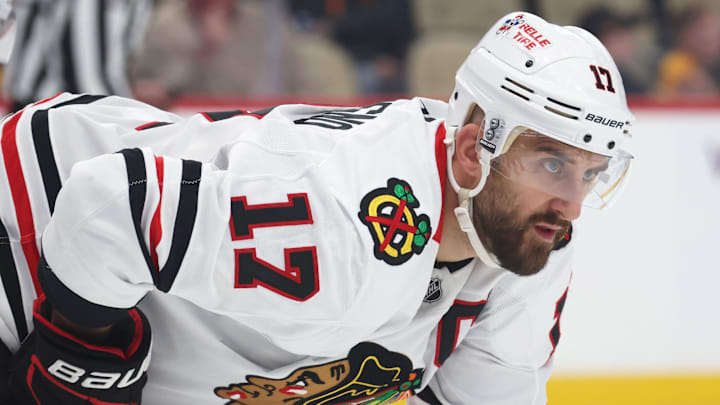Apr 8, 2025; Pittsburgh, Pennsylvania, USA;  Chicago Blackhawks left wing Nick Foligno (17) at the face-off circle against the Pittsburgh Penguins during the third period at PPG Paints Arena. Mandatory Credit: Charles LeClaire-Imagn Images