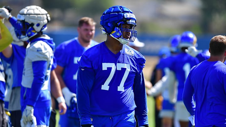 Jun 8, 2022; Los Angeles, CA, USA;  Los Angeles Rams tackle Alaric Jackson (77) during mini camp at Cal Lutheran University. Mandatory Credit: Gary A. Vasquez-Imagn Images