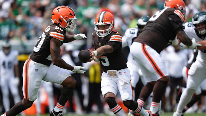Aug 16, 2025; Philadelphia, Pennsylvania, USA; Cleveland Browns quarterback Dillon Gabriel (5) hands the ball off to running back Pierre Strong Jr (20) against the Philadelphia Eagles in the first half at Lincoln Financial Field. Mandatory Credit: Kyle Ross-Imagn Images