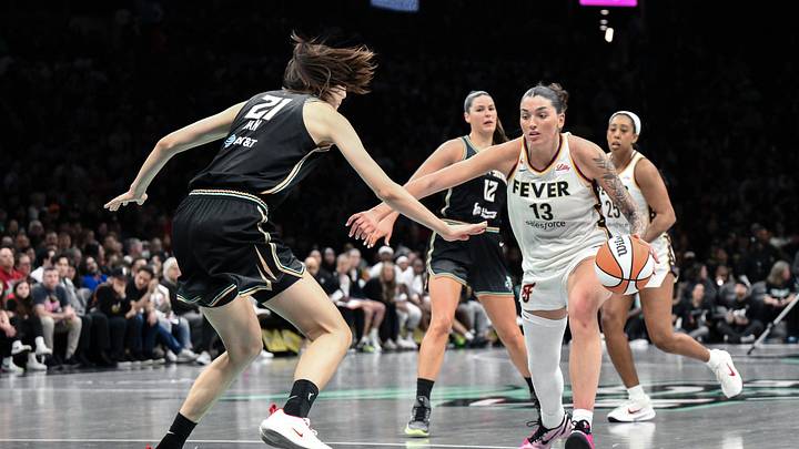 Apr 25, 2026; Brooklyn, NY, USA; Indiana Fever guard Justine Pissott (13) tries to drive past New York Liberty center Han Xu (21) during the first half at Barclays Center. Mandatory Credit: John Jones-Imagn Images Apr 25, 2026; Brooklyn, NY, USA; Indiana Fever guard Justine Pissott (13) tries to drive past New York Liberty center Han Xu (21) during the first half at Barclays Center. Mandatory Credit: John Jones-Imagn Images