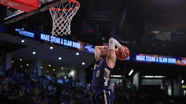 Feb 1, 2025; Atlanta, Georgia, USA; Georgia Tech Yellow Jackets guard Lance Terry (0) dunks against the Louisville Cardinals in the second half at McCamish Pavilion. Mandatory Credit: Brett Davis-Imagn Images Feb 1, 2025; Atlanta, Georgia, USA; Georgia Tech Yellow Jackets guard Lance Terry (0) dunks against the Louisville Cardinals in the second half at McCamish Pavilion. Mandatory Credit: Brett Davis-Imagn Images