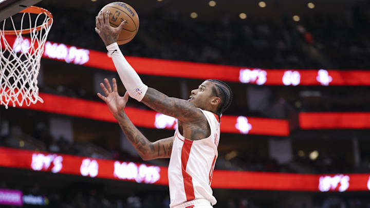 Nov 6, 2024; Houston, Texas, USA; Houston Rockets guard Jalen Green (4) shoots the ball during the third quarter against the San Antonio Spurs at Toyota Center. Mandatory Credit: Troy Taormina-Imagn Images