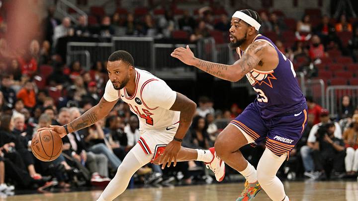 Oct 7, 2026; Chicago, Illinois, USA; Chicago Bulls guard Norman Powell (24) drives the ball against Phoenix Suns guard Jordan Goodwin (23) during the first half at United Center. Mandatory Credit: Patrick Gorski-Imagn Images Oct 7, 2026; Chicago, Illinois, USA; Chicago Bulls guard Norman Powell (24) drives the ball against Phoenix Suns guard Jordan Goodwin (23) during the first half at United Center. Mandatory Credit: Patrick Gorski-Imagn Images