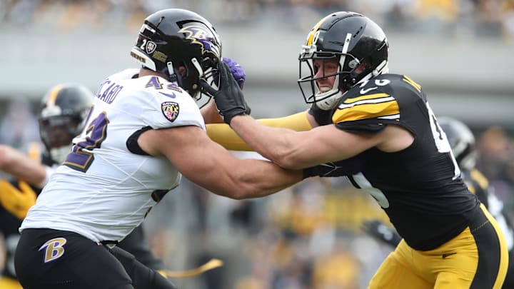 Nov 17, 2024; Pittsburgh, Pennsylvania, USA;  Baltimore Ravens fullback Patrick Ricard (42) blocks Pittsburgh Steelers linebacker T.J. Watt (90) at the line of scrimmage during the second quarter at Acrisure Stadium. Mandatory Credit: Charles LeClaire-Imagn Images