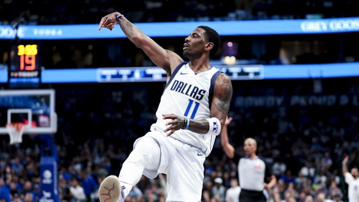 Feb 27, 2025; Dallas, Texas, USA;  Dallas Mavericks guard Kyrie Irving (11) reacts after shooting against the Charlotte Hornets during the second half at American Airlines Center. Mandatory Credit: Kevin Jairaj-Imagn Images
