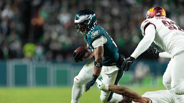 Nov 14, 2024; Philadelphia, Pennsylvania, USA; Philadelphia Eagles running back Saquon Barkley (26) runs with the ball W| during the second quarter at Lincoln Financial Field.