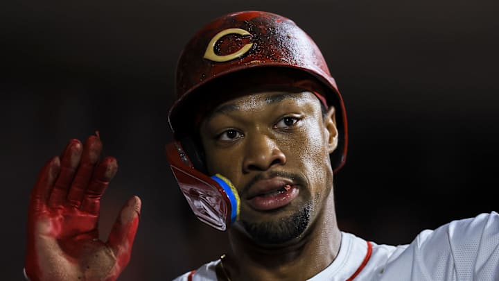 Sep 3, 2025; Cincinnati, Ohio, USA; Cincinnati Reds pinch hitter Will Benson (30) high fives teammates after scoring on a RBI double hit by second baseman Matt McLain (not pictured) in the eighth inning against the Toronto Blue Jays at Great American Ball Park. Mandatory Credit: Katie Stratman-Imagn Images Sep 3, 2025; Cincinnati, Ohio, USA; Cincinnati Reds pinch hitter Will Benson (30) high fives teammates after scoring on a RBI double hit by second baseman Matt McLain (not pictured) in the eighth inning against the Toronto Blue Jays at Great American Ball Park. Mandatory Credit: Katie Stratman-Imagn Images