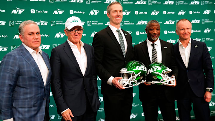 New York Jets President, Hymie Elhai, owner, Woody Johnson, general manager, Darren Mougey, head coach, Aaron Glenn and vice chairman, Christopher Johnson, pose for a photograph, Monday, January 27, 2025, in Florham Park.