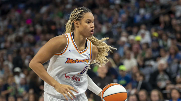Sep 21, 2025; Minneapolis, Minnesota, USA; Phoenix Mercury forward Satou Sabally (0) dribbles the ball against the Minnesota Lynx in the second half during game one of the second round for the 2025 WNBA Playoffs at Target Center. Mandatory Credit: Jesse Johnson-Imagn Images