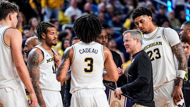 Michigan head coach Dusty May talks to players at a timeout against Indiana during the second half at Crisler Center in Ann Arbor on Tuesday, Jan. 20, 2026.