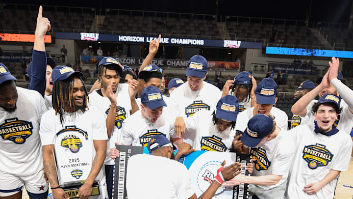 Mar 11, 2025; Indianapolis, IN, USA; The Robert Morris Colonials celebrate after defeating the Youngstown State Penguins to win the Horizon League Championship at Corteva Coliseum. Mandatory Credit: Robert Goddin-Imagn Images