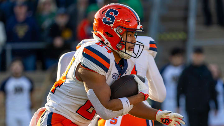 Nov 22, 2025; South Bend, Indiana, USA; Syracuse Orange running back Will Nixon (24) runs the ball against the Notre Dame Fighting Irish during the first half at Notre Dame Stadium.