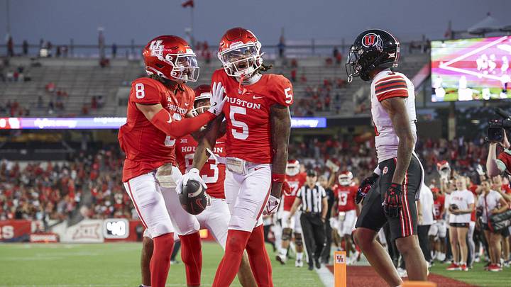 Oct 26, 2024; Houston, Texas, USA; Houston Cougars wide receiver Stephon Johnson (5) celebrates after a touchdown reception during the second quarter against the Utah Utes at TDECU Stadium. Mandatory Credit: Troy Taormina-Imagn Images