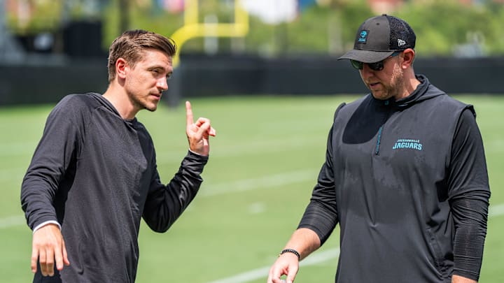 Jacksonville Jaguars general manager James Gladstone, left, talks with Jacksonville Jaguars head coach Liam Coen, right, after the. Jacksonville Jaguars’ mandatory minicamp Tuesday June 10, 2025 at the Miller Electric Center in Jacksonville, Fla. [Doug Engle/Florida Times-Union]