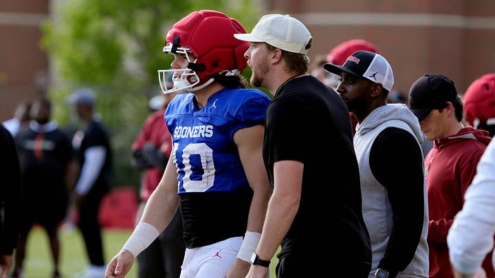 Ben Arbuckle, Oklahoma offensive coordinator, talks with John Mateer during a Sooners football spring practice in Norman, Okla., Thursday, April 9, 2026. Ben Arbuckle, Oklahoma offensive coordinator, talks with John Mateer during a Sooners football spring practice in Norman, Okla., Thursday, April 9, 2026.