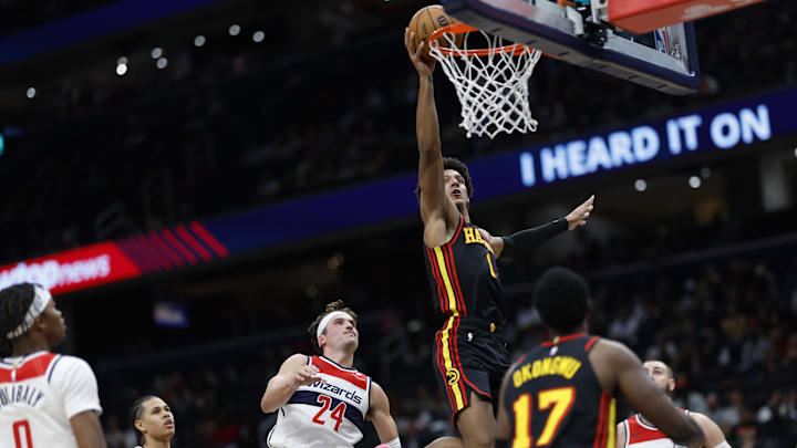 Oct 30, 2024; Washington, District of Columbia, USA; Atlanta Hawks forward Jalen Johnson (1) shoots the ball as Washington Wizards forward Corey Kispert (24) defends in the first half at Capital One Arena. Mandatory Credit: Geoff Burke-Imagn Images Oct 30, 2024; Washington, District of Columbia, USA; Atlanta Hawks forward Jalen Johnson (1) shoots the ball as Washington Wizards forward Corey Kispert (24) defends in the first half at Capital One Arena. Mandatory Credit: Geoff Burke-Imagn Images
