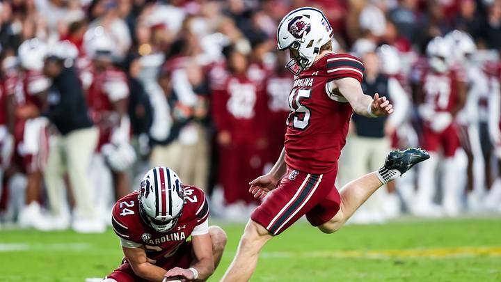 Oct 25, 2025; Columbia, South Carolina, USA; South Carolina Gamecocks kicker William Joyce (45) kicks an extra point against the Alabama Crimson Tide in the second half at Williams-Brice Stadium. Mandatory Credit: Jeff Blake-Imagn Images