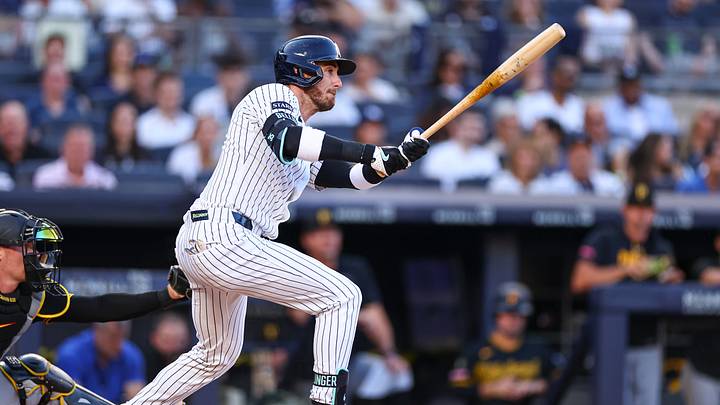 New York Yankees left fielder Cody Bellinger (35) singles during the first inning against the Pittsburgh Pirates at Yankee Stadium. 