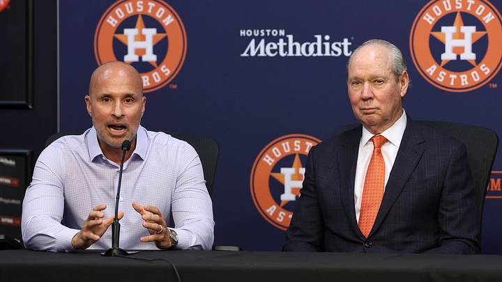Jan 5, 2026; Houston, TX, USA; Houston Astros manager Joe Espada (left) talks and owner Jim Crane looks on during a press conference to intruduce pitcher Tatsuya Imai at Daikin Park. Mandatory Credit: Troy Taormina-Imagn Images