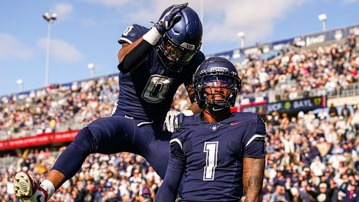 Nov 1, 2025; East Hartford, Connecticut, USA; UConn Huskies wide receiver Skyler Bell (1) reacts after his touchdown against the UAB Blazers in the second quarter at Pratt & Whitney Stadium at Rentschler Field. Mandatory Credit: David Butler II-Imagn Images