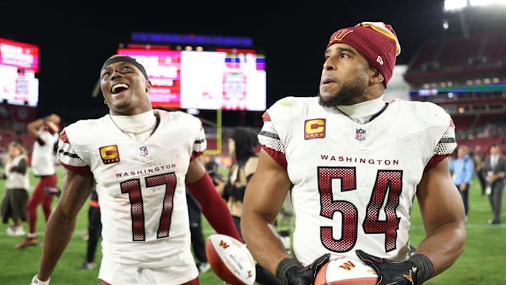 Jan 12, 2025; Tampa, Florida, USA; Washington Commanders wide receiver Terry McLaurin (17) and linebacker Bobby Wagner (54) celebrate after winning a NFC wild card playoff against the Tampa Bay Buccaneers at Raymond James Stadium. Mandatory Credit: Nathan Ray Seebeck-Imagn Images