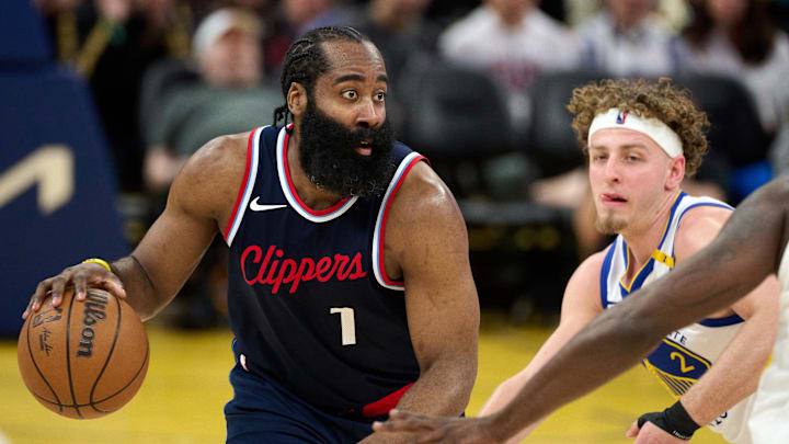 Apr 13, 2025; San Francisco, California, USA; LA Clippers guard James Harden (1) controls the ball against Golden State Warriors guard Brandin Podziemski (2) during the third quarter at Chase Center. Mandatory Credit: Robert Edwards-Imagn Images Apr 13, 2025; San Francisco, California, USA; LA Clippers guard James Harden (1) controls the ball against Golden State Warriors guard Brandin Podziemski (2) during the third quarter at Chase Center. Mandatory Credit: Robert Edwards-Imagn Images