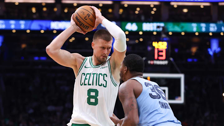 Dec 7, 2024; Boston, Massachusetts, USA; Boston Celtics center Kristaps Porzingis (8) possesses the ball during the first half against the Memphis Grizzlies at TD Garden. Mandatory Credit: Paul Rutherford-Imagn Images Dec 7, 2024; Boston, Massachusetts, USA; Boston Celtics center Kristaps Porzingis (8) possesses the ball during the first half against the Memphis Grizzlies at TD Garden. Mandatory Credit: Paul Rutherford-Imagn Images