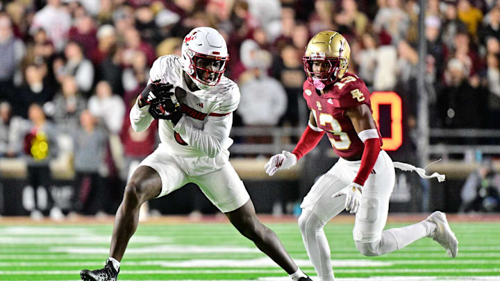 Oct 25, 2024; Chestnut Hill, Massachusetts, USA; Louisville Cardinals wide receiver Chris Bell (0) runs after making a catch against the Boston College Eagles during the first half at Alumni Stadium. Mandatory Credit: Eric Canha-Imagn Images Oct 25, 2024; Chestnut Hill, Massachusetts, USA; Louisville Cardinals wide receiver Chris Bell (0) runs after making a catch against the Boston College Eagles during the first half at Alumni Stadium. Mandatory Credit: Eric Canha-Imagn Images