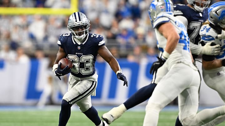 Dec 4, 2025; Detroit, Michigan, USA; Dallas Cowboys running back Javonte Williams (33) runs during the first half against the Detroit Lions at Ford Field. Mandatory Credit: Lon Horwedel-Imagn Images